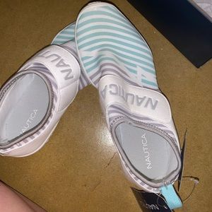 Nautical slip on sneakers.  Never worn.  New with tags!